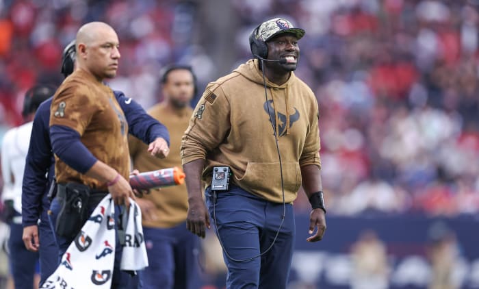 Nov 19, 2023; Houston, Texas, USA; Houston Texans defensive line coach Jacques Cesaire reacts during the game against the Arizona Cardinals at NRG Stadium. Mandatory Credit: Troy Taormina-USA TODAY Sports